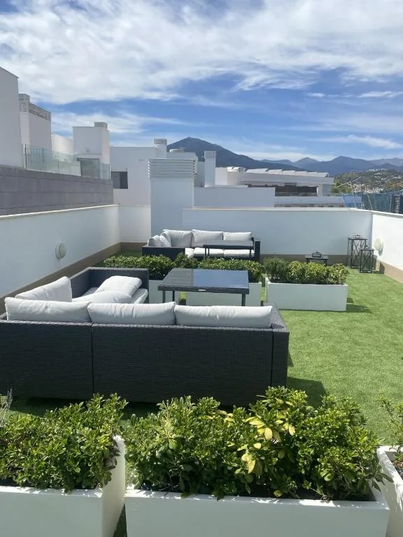 Daktuin met lounge en bergzicht, Residencia Jardin del Rio